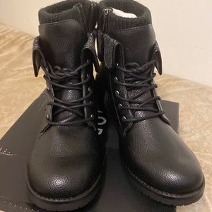 Size 13 black sweater combat boots from Torrid. Never worn before.